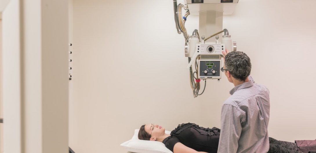 a women is diagnosed with xray machine